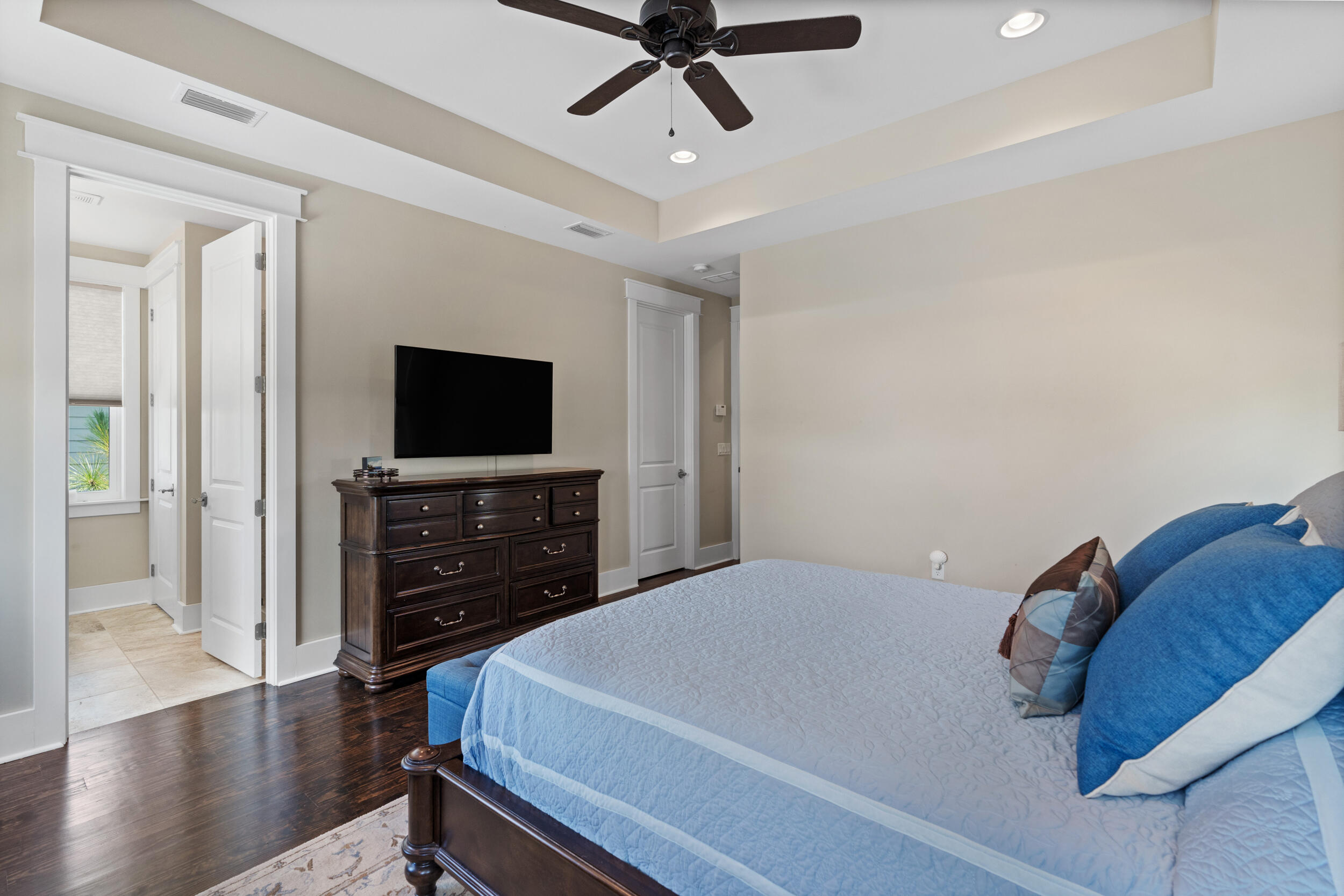 694 Flatwoods Forest Loop Santa Rosa Beach, FL 32459 - Photo 30 of 50 a bedroom with a bed and a flat screen tv