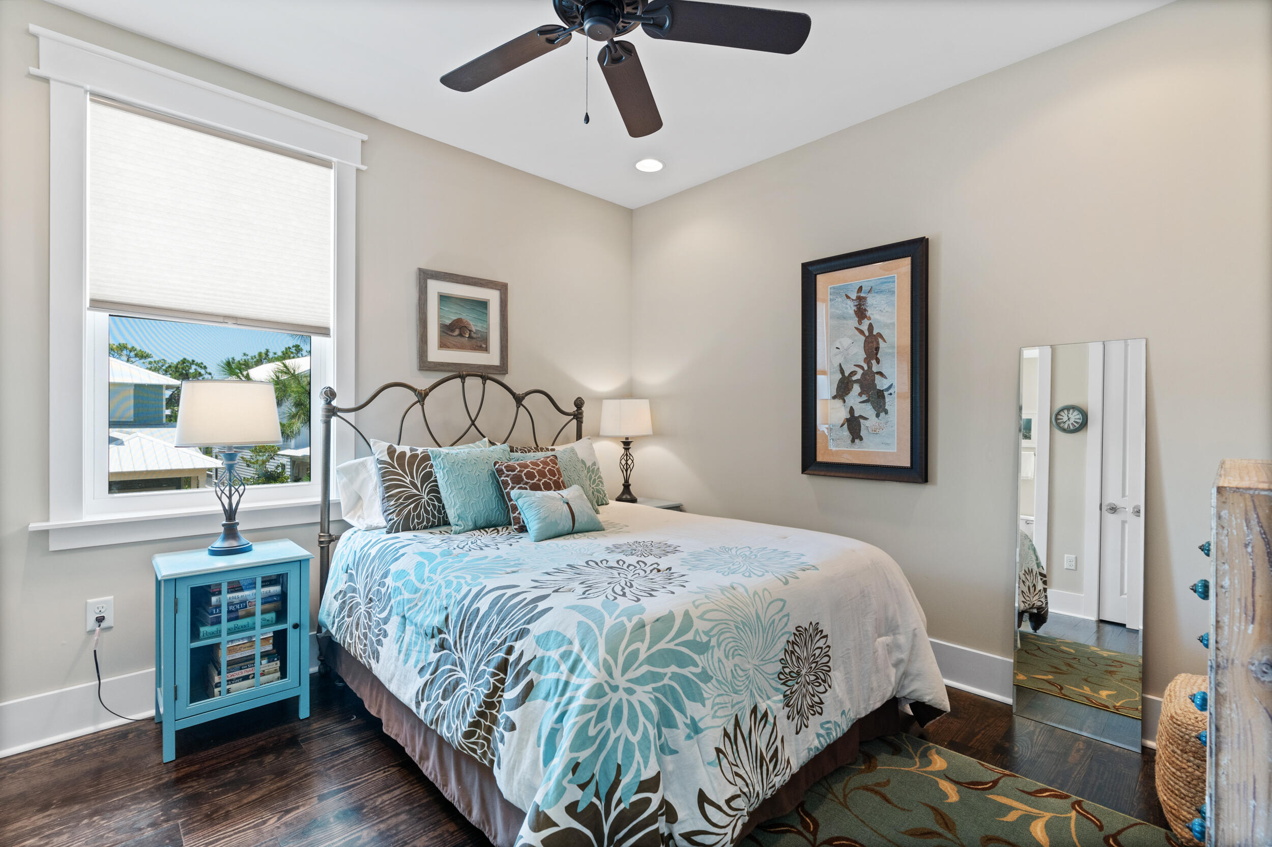 694 Flatwoods Forest Loop Santa Rosa Beach, FL 32459 - Photo 31 of 50 a bedroom with a bed and wooden floor