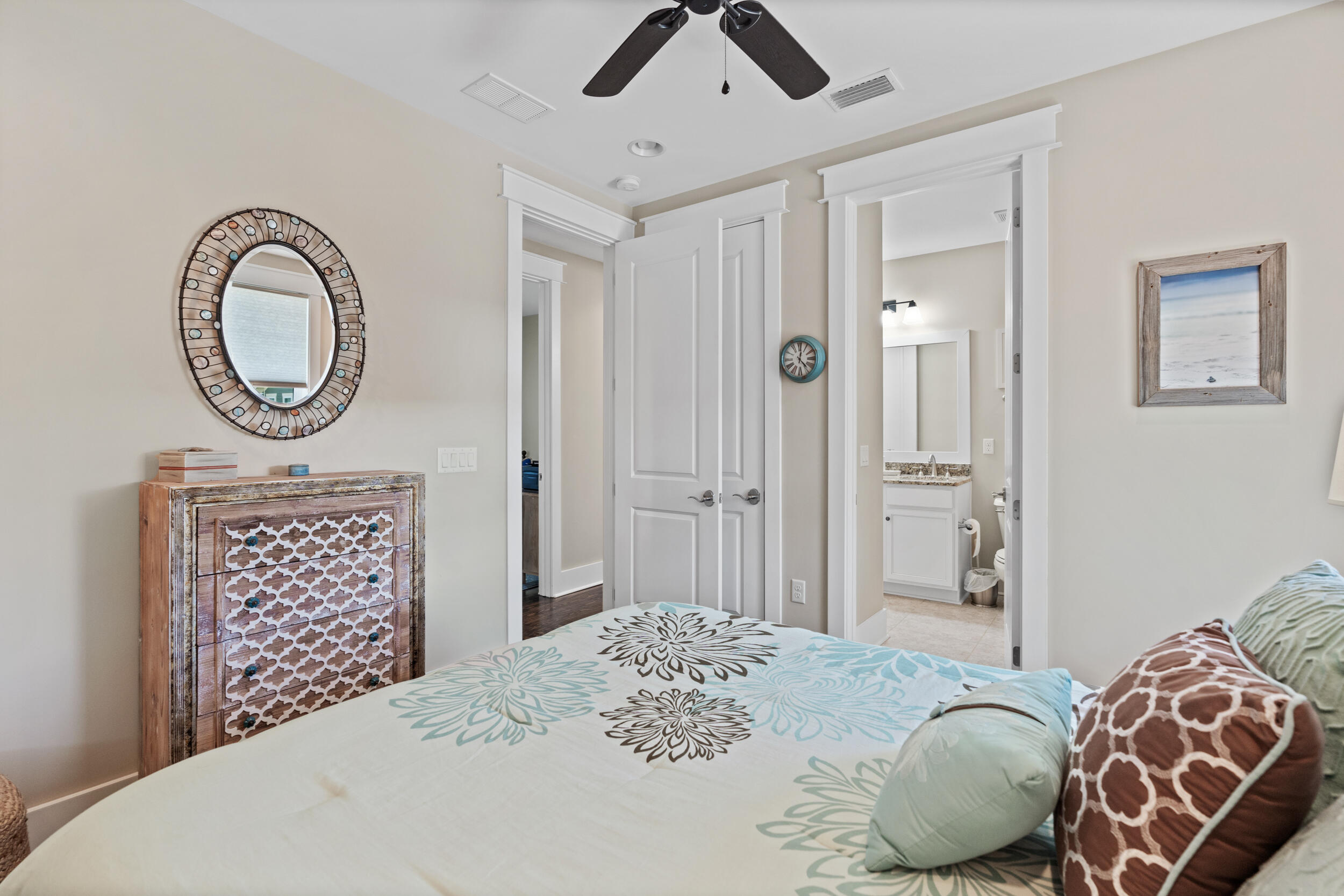 694 Flatwoods Forest Loop Santa Rosa Beach, FL 32459 - Photo 33 of 50 a bedroom with a bed dresser and a window