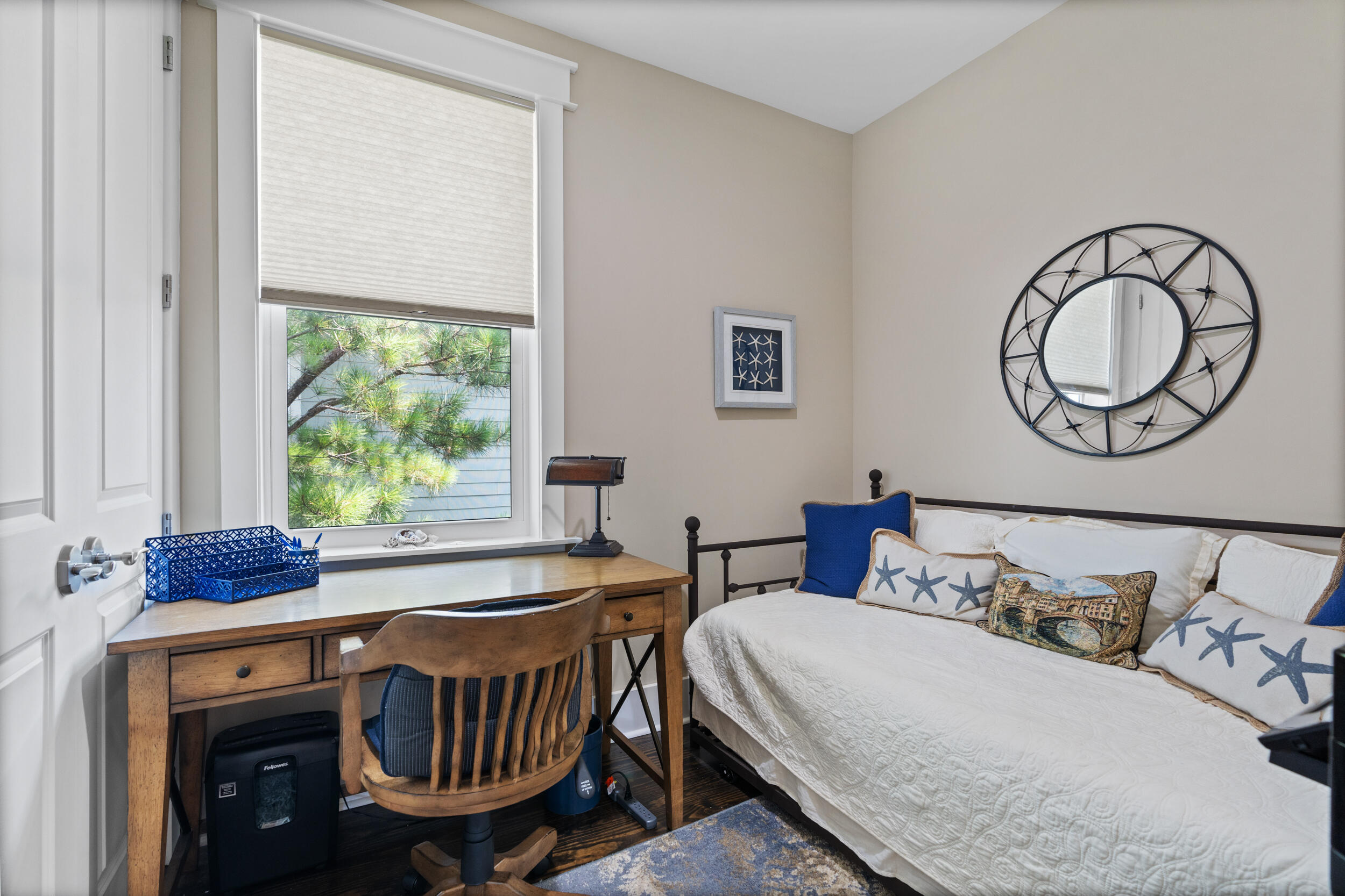 694 Flatwoods Forest Loop Santa Rosa Beach, FL 32459 - Photo 34 of 50 a bedroom with a bed and a table