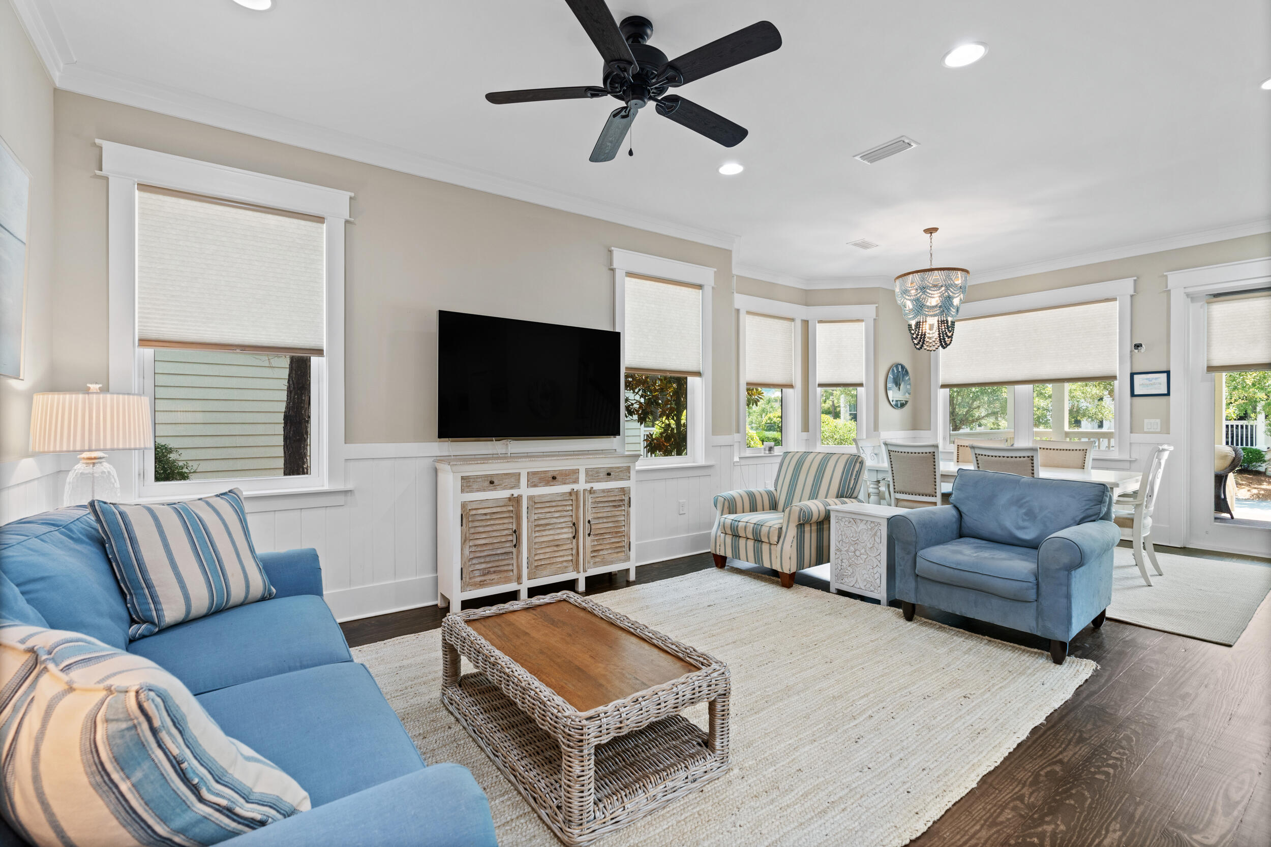 694 Flatwoods Forest Loop Santa Rosa Beach, FL 32459 - Photo 7 of 50 a living room with furniture and a flat screen tv