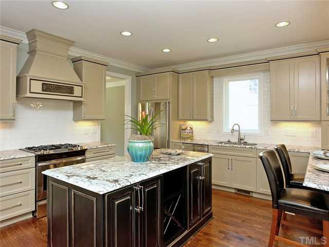 2321 Finley Ridge Lane Raleigh, NC 27615 - Photo 3 of 25 Award Winning Kitchen!!! This Gorgeous Kitchen Just Won A Kitchen Design Award In The 2011 Parade Of Homes. Special Features Like Exotic Granite, Island Wine Storage, Hardwood Floors, Gas Cook Top And Stainless Steel Appliances Stole The Show. Tennis Court