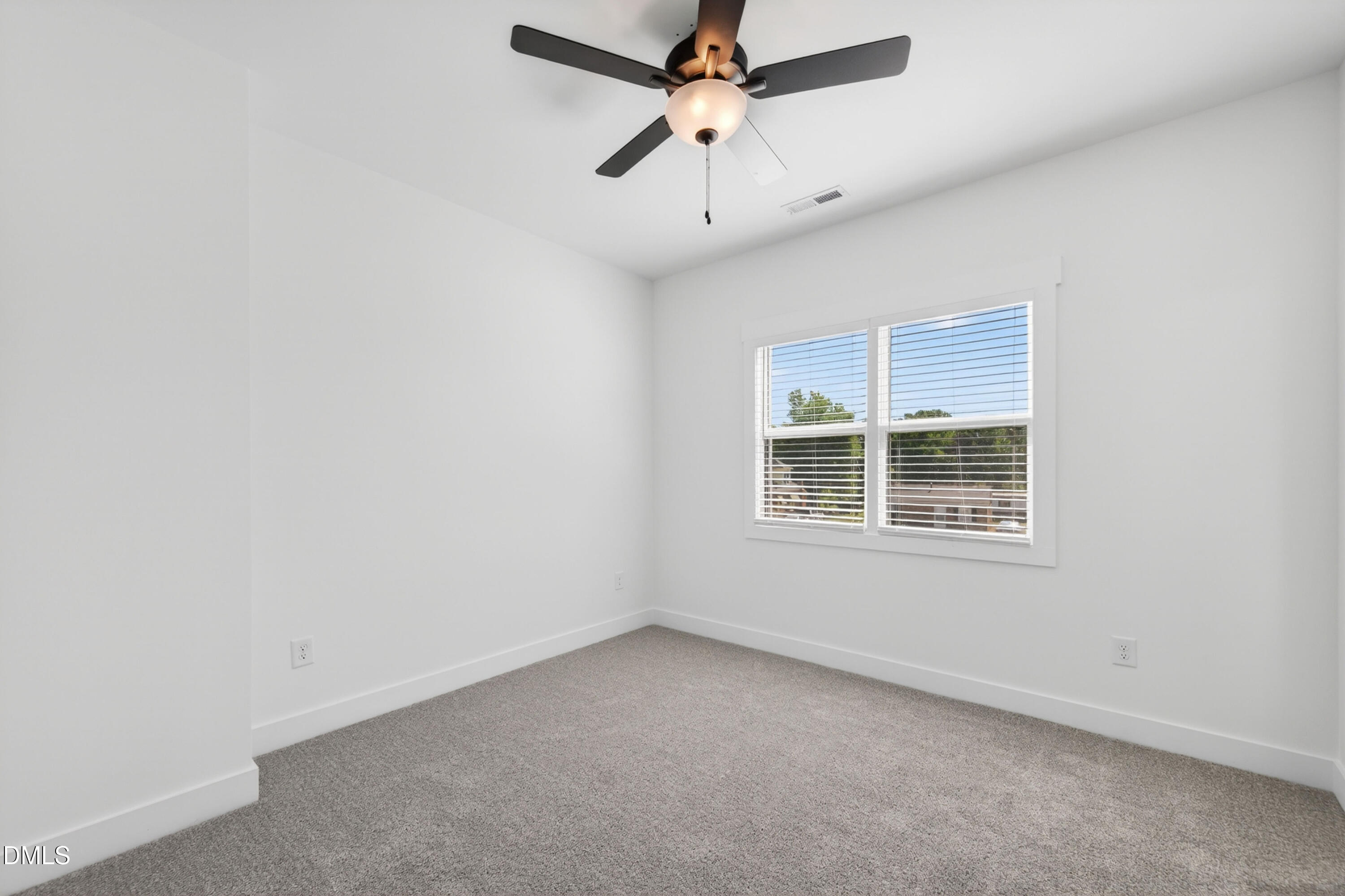 1196 Hurdle Mills Road Roxboro, NC 27573 - Photo 35 of 50 an empty room with a window