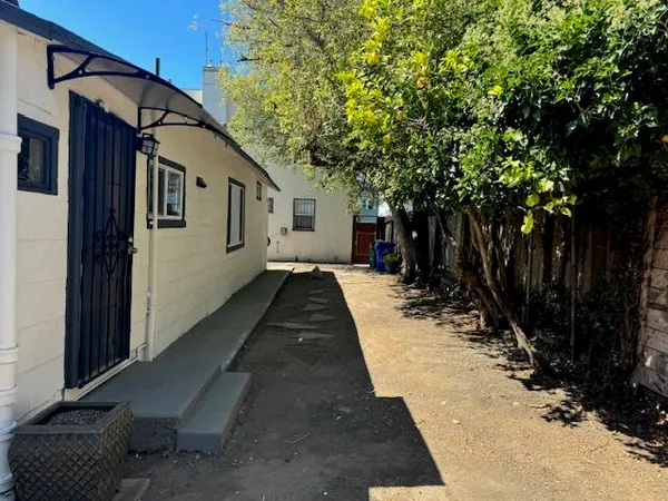 a view of a back yard of the house
