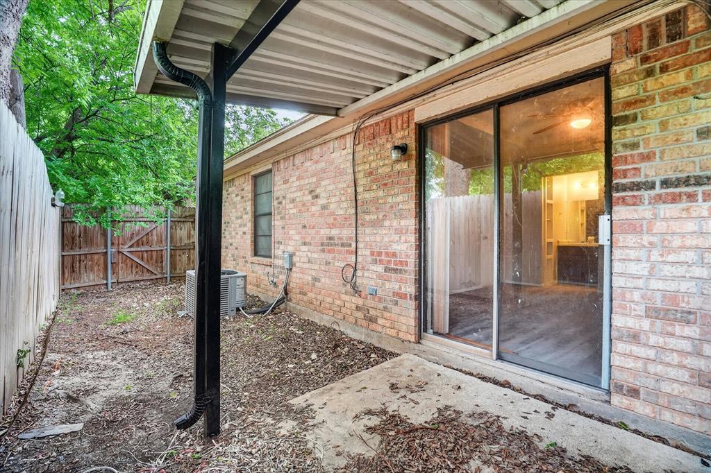 119 Del Rio Avenue, Unit C Benbrook, TX 76126 - Photo 15 of 17 a view of a porch with a backyard