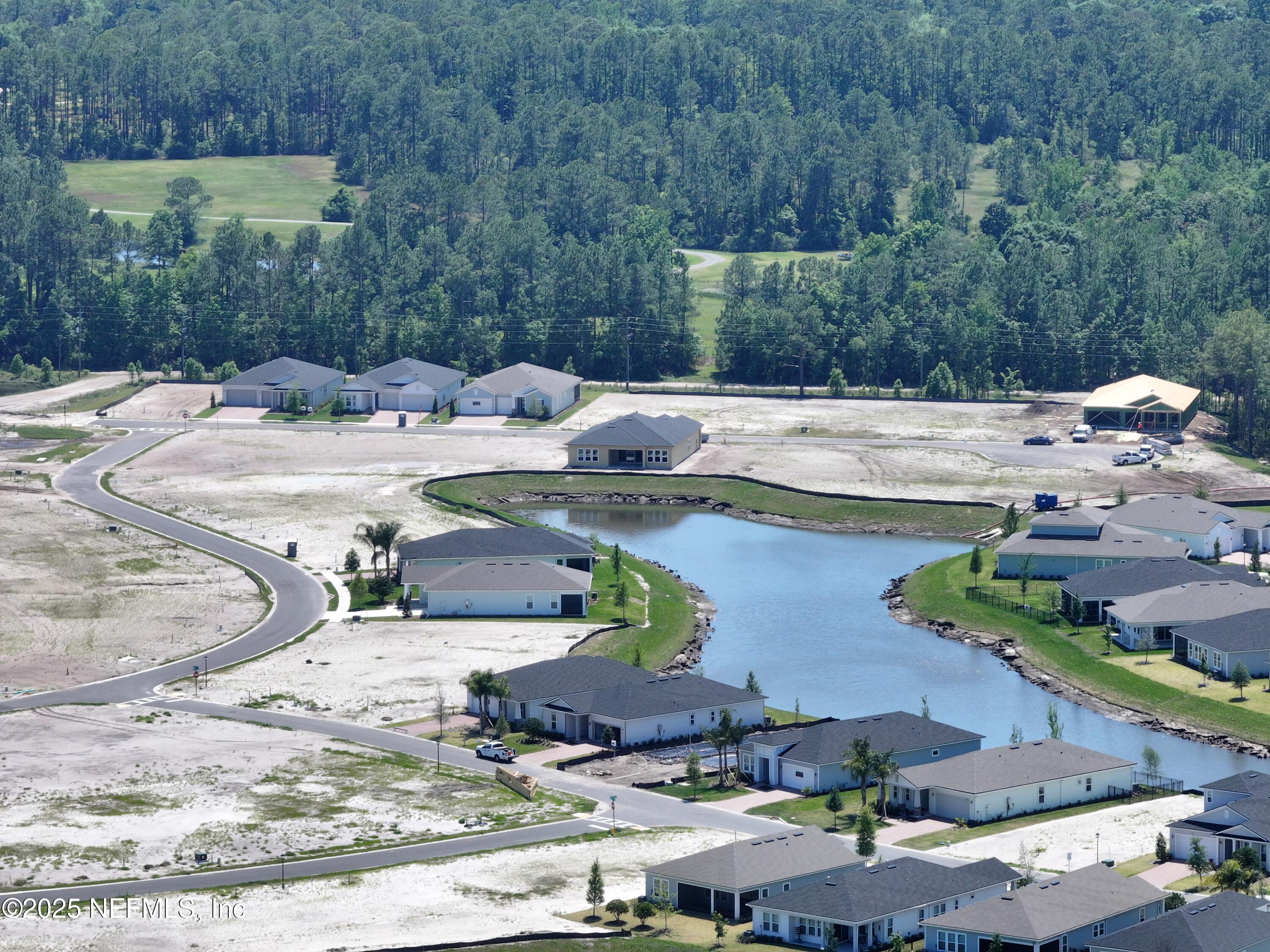 268 Blackbird Lane St. Augustine, FL 32092 - Photo 21 of 33 a view of a swimming pool with a yard