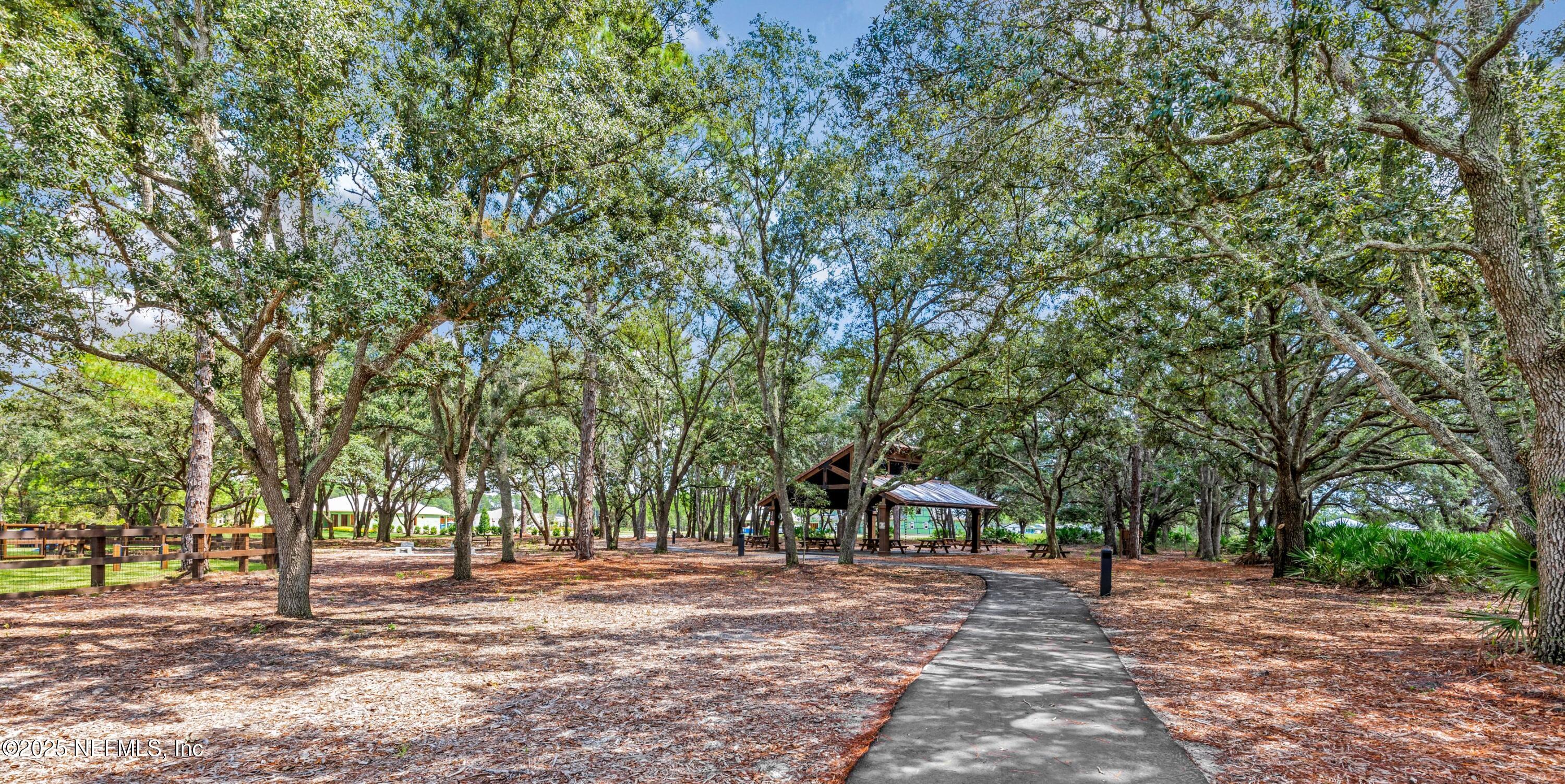 268 Blackbird Lane St. Augustine, FL 32092 - Photo 27 of 33 a view of a outdoor space with trees