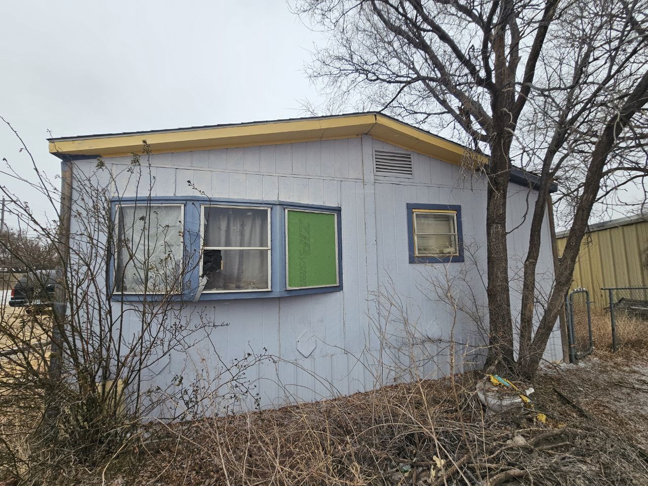 500 Ross Street Vega, TX 79092 - Photo 4 of 7 a front view of a house with garden