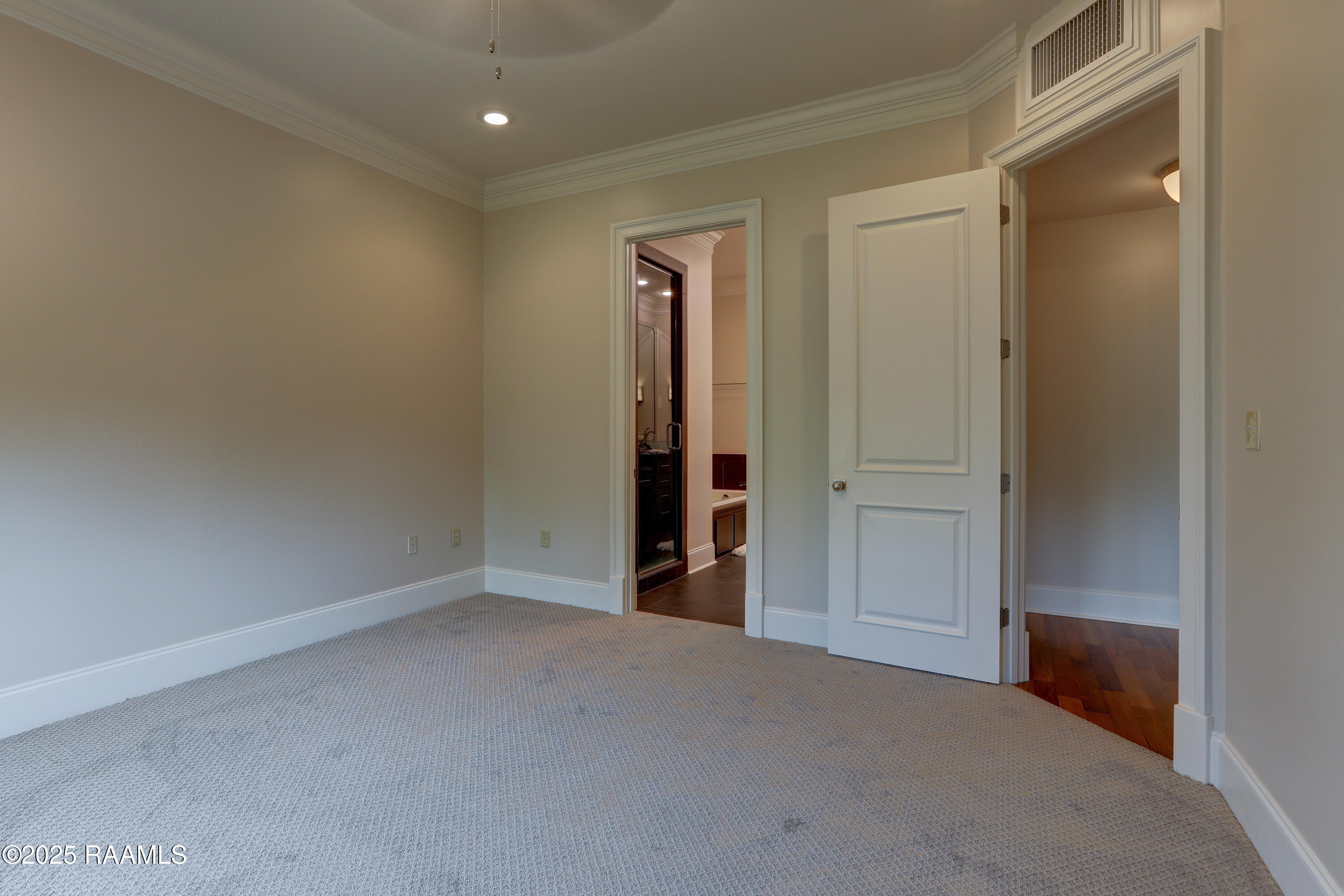 605 Silverstone Road, Unit 205B Lafayette, LA 70508 - Photo 30 of 48 Primary Bedroom