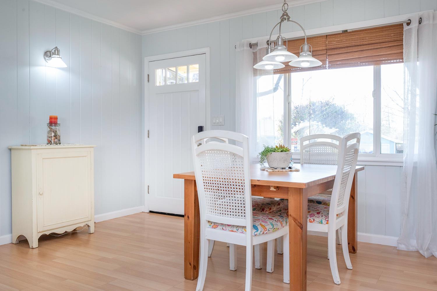 524 Williams Street Murphys, CA 95247 - Photo 27 of 64 a view of a dining room with furniture window and wooden floor