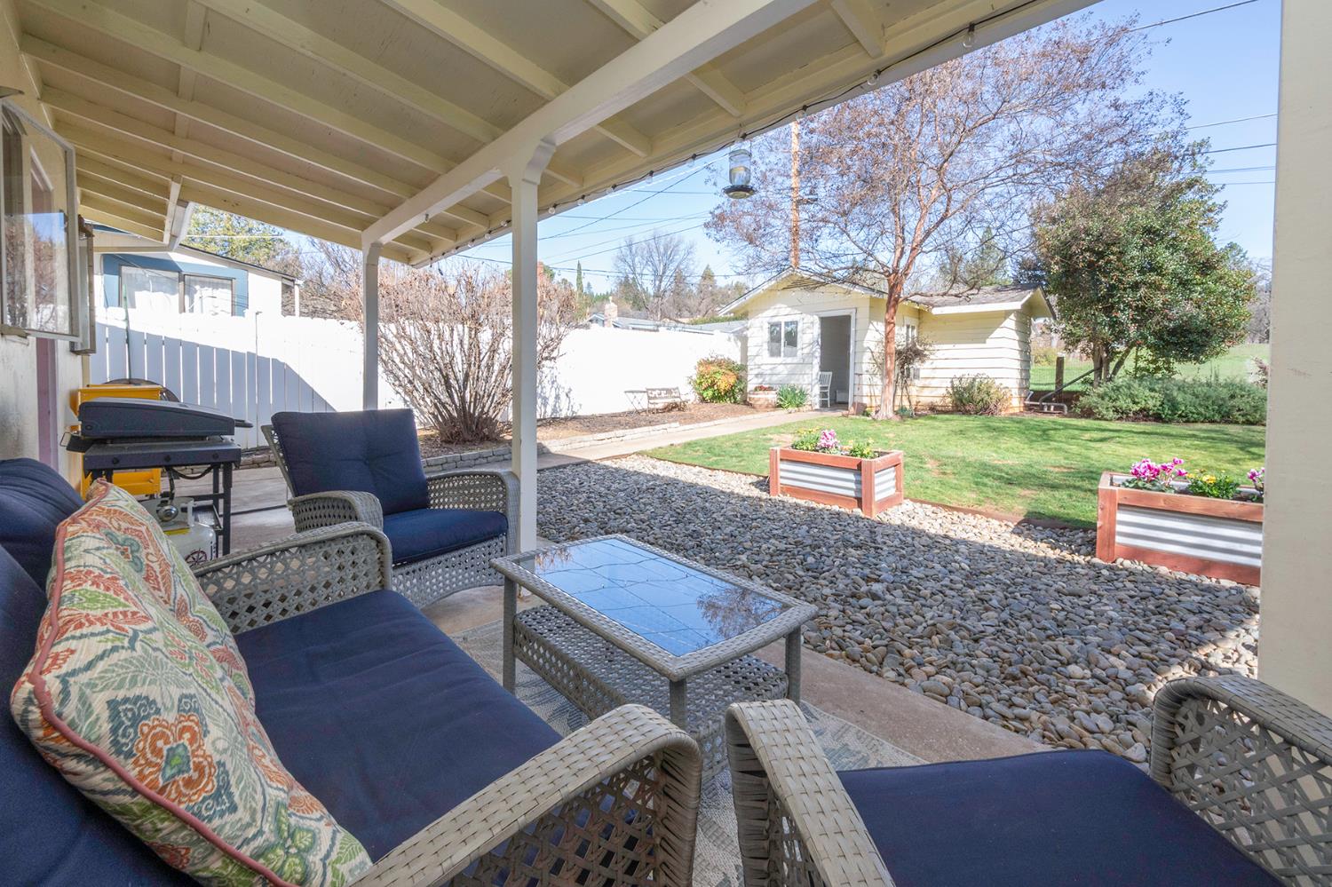 524 Williams Street Murphys, CA 95247 - Photo 38 of 64 a living room with furniture and a floor to ceiling window
