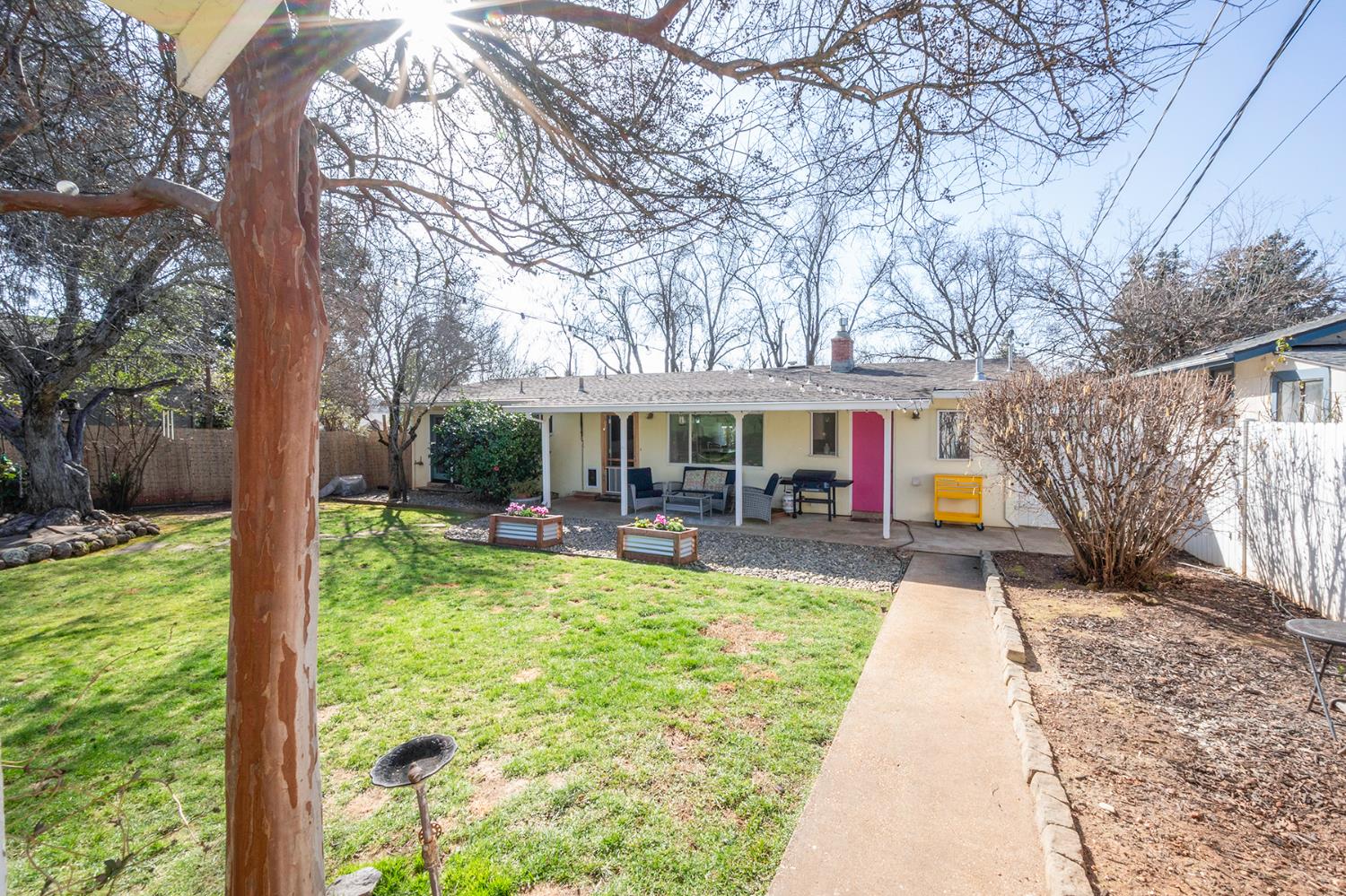 524 Williams Street Murphys, CA 95247 - Photo 48 of 64 a view of house with swimming pool outdoor seating and covered with trees