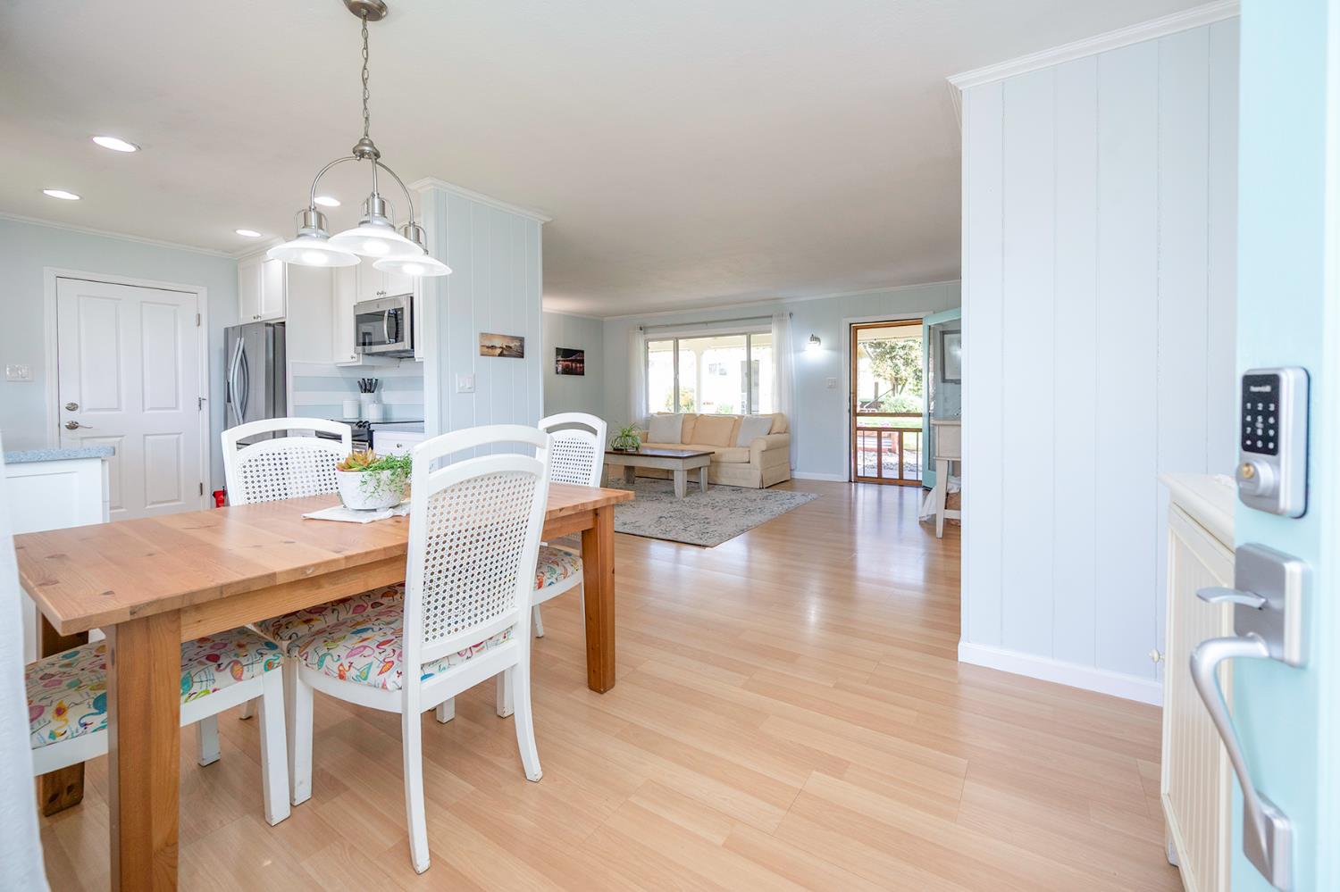 524 Williams Street Murphys, CA 95247 - Photo 6 of 64 a view of a dining room with furniture wooden floor and a chandelier