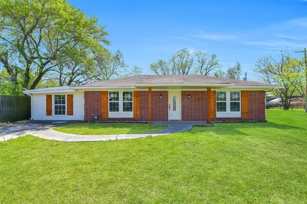 front view of a house and a yard