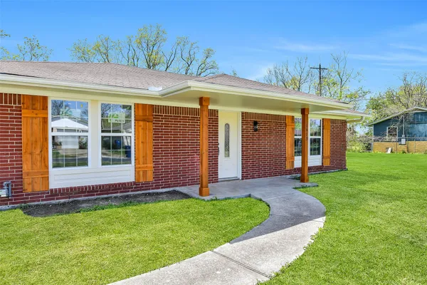 a view of a house with garden