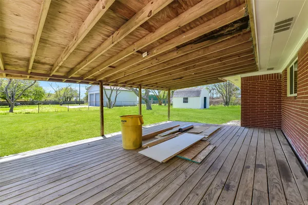swimming pool view with a garden space