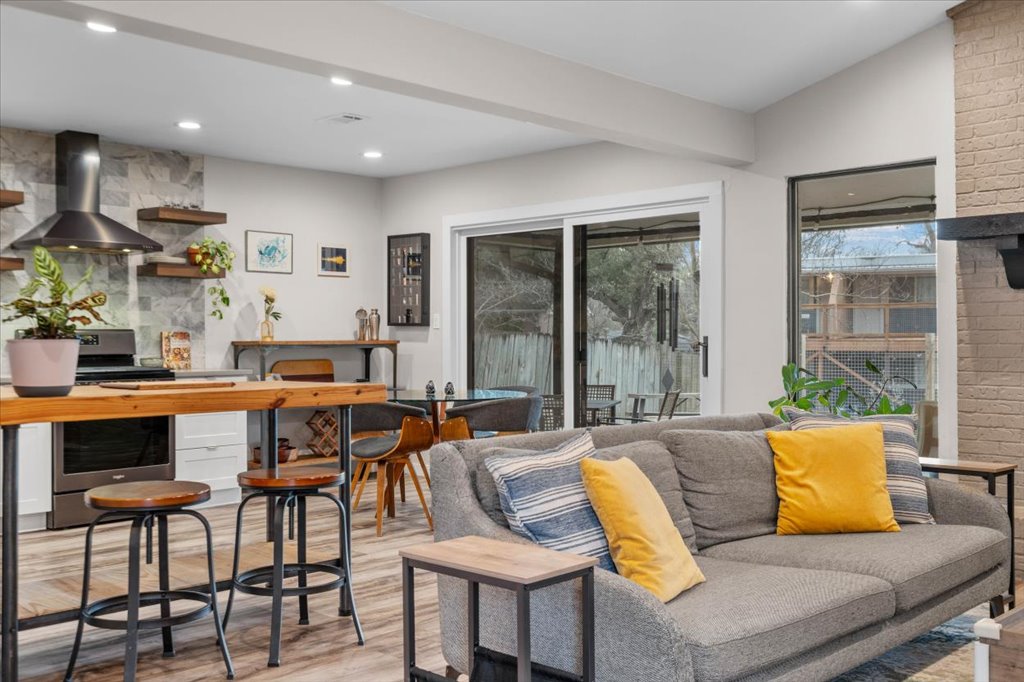 3010 Burleson Road, Unit A Austin, TX 78741 - Photo 6 of 28 Living area featuring light wood-style flooring and recessed lighting