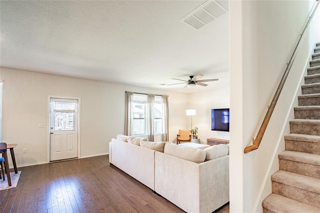 547 Saturnia Drive Georgetown, TX 78628 - Photo 12 of 39 a living room with furniture and a flat screen tv