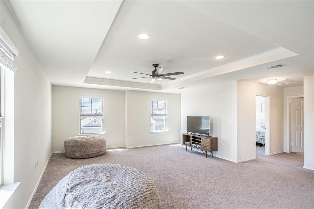 547 Saturnia Drive Georgetown, TX 78628 - Photo 21 of 39 a bedroom with furniture and a window