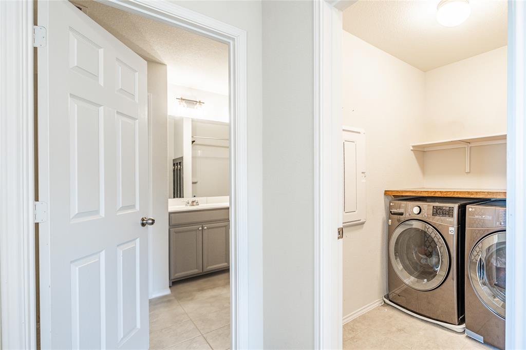 547 Saturnia Drive Georgetown, TX 78628 - Photo 26 of 39 a view of a hallway with washer and dryer