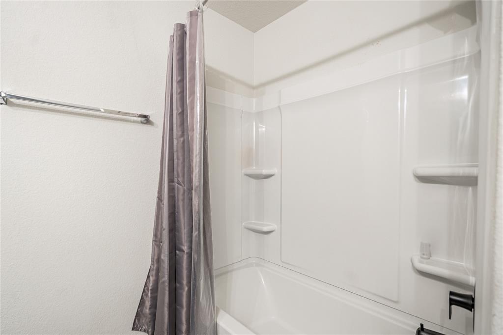 547 Saturnia Drive Georgetown, TX 78628 - Photo 28 of 39 a bathroom with a shower