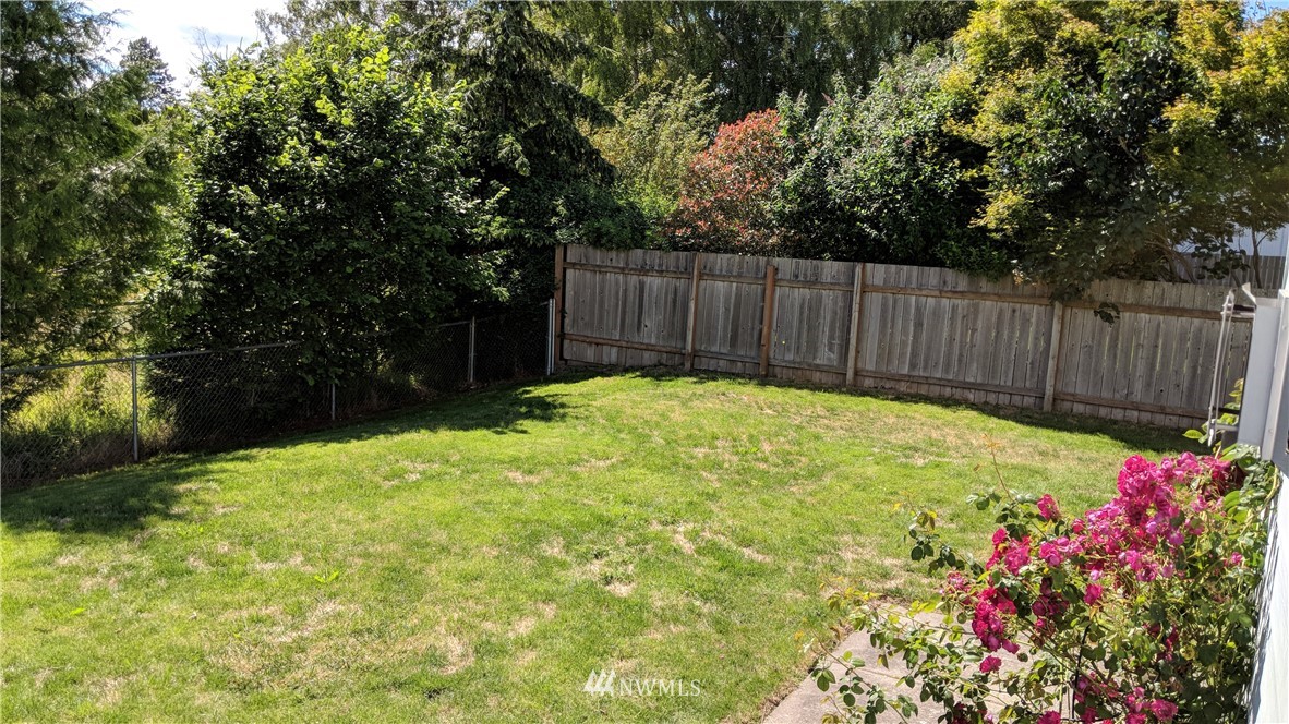 3224 Locust Avenue Bellingham, WA 98225 - Photo 2 of 28 a view of garden with wooden fence