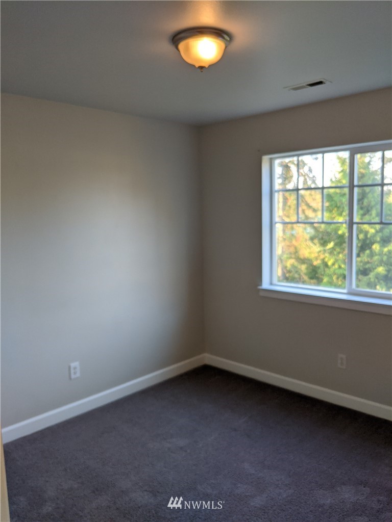 3224 Locust Avenue Bellingham, WA 98225 - Photo 20 of 28 an empty room with a window