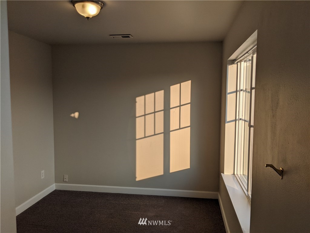 3224 Locust Avenue Bellingham, WA 98225 - Photo 23 of 28 a view of an empty room with a window