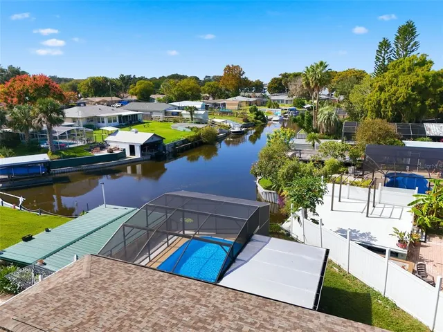 a couple of flower plants in front of house