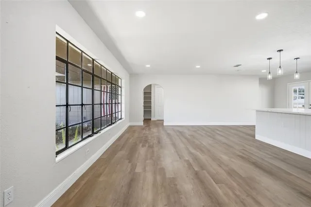 a view of a swimming pool with a porch