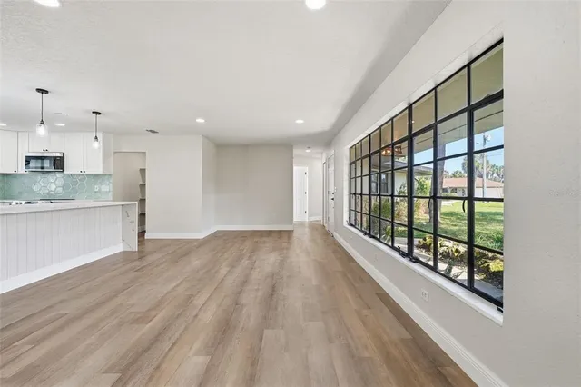 a bathroom with a sink and a window