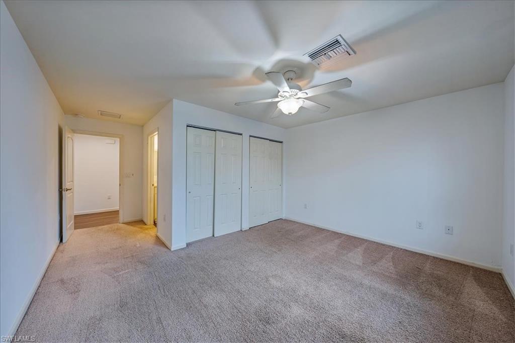 327 Benson Street Naples, FL 34113 - Photo 13 of 24 PRIMARY BEDROOM