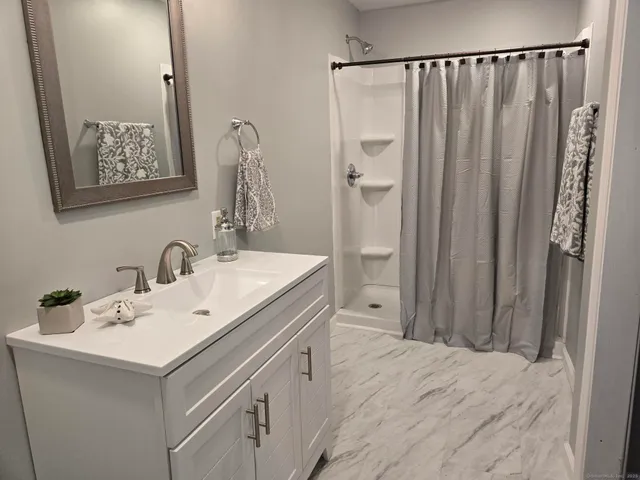 a picture of a bench in a white building