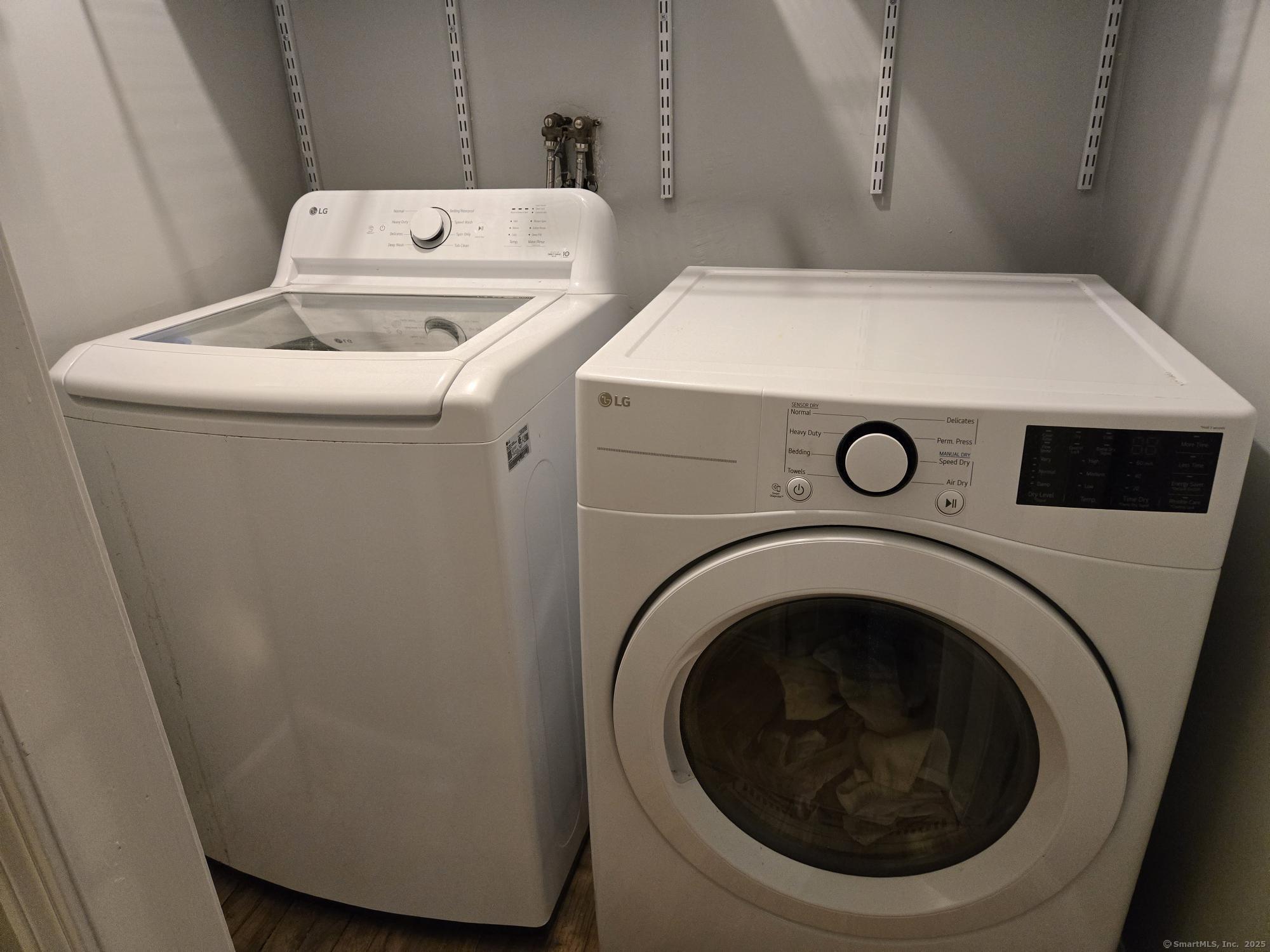 297 Wickham Road Glastonbury, CT 06033 - Photo 39 of 39 a utility room with dryer and washer