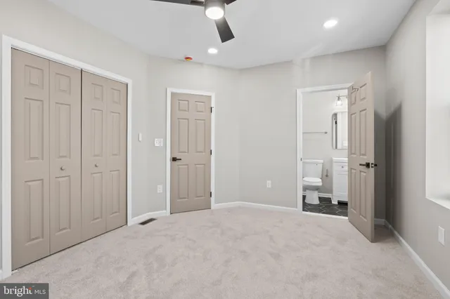a view of a livingroom with a bathroom