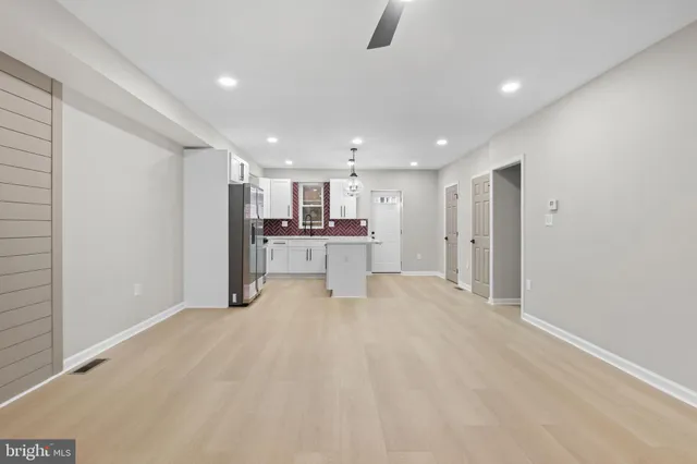 a view of a kitchen with a sink