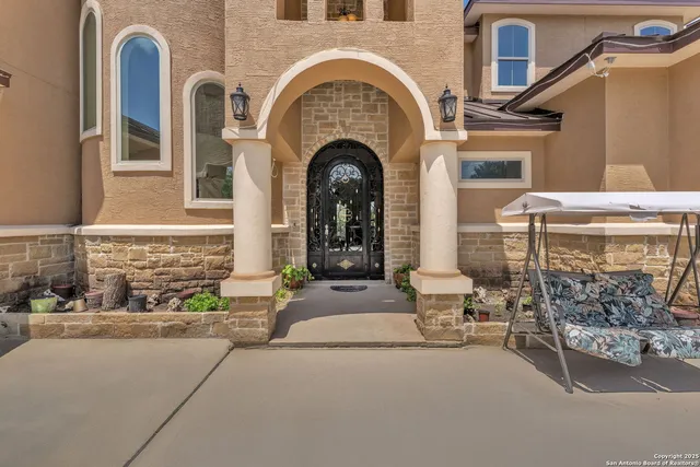 a front view of a house with garage