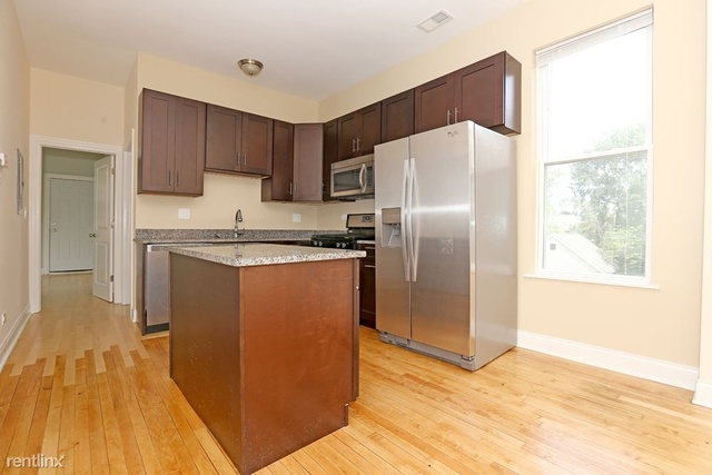Undisclosed Address Chicago, IL 60622 - Photo 2 of 13 a kitchen with stainless steel appliances granite countertop a refrigerator a sink and a stove