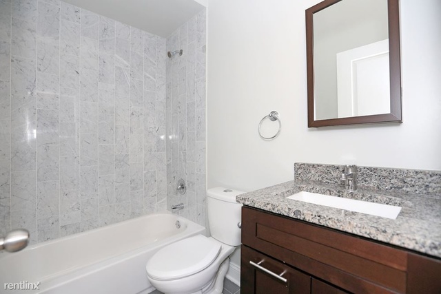 Undisclosed Address Chicago, IL 60622 - Photo 7 of 13 a bathroom with a granite countertop sink a toilet and bathtub