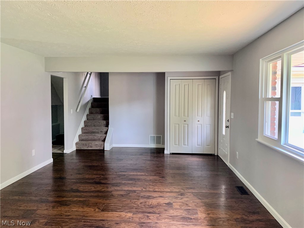 18124 Drake Road Strongsville, OH 44136 - Photo 5 of 27 Front living room with stairs to upper level