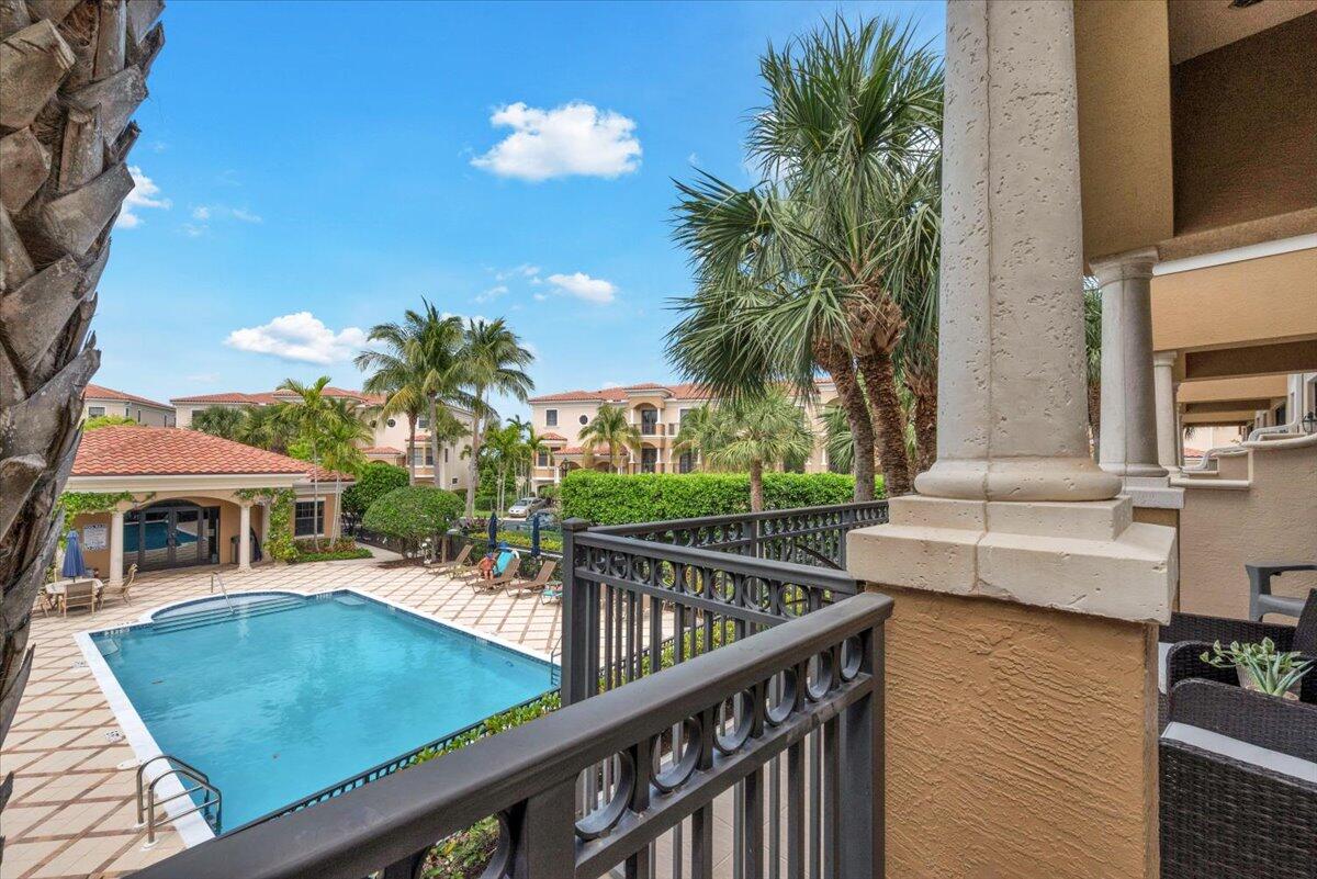 502 Del Sol Circle Tequesta, FL 33469 - Photo 23 of 73 a view of house with swimming pool outdoor seating