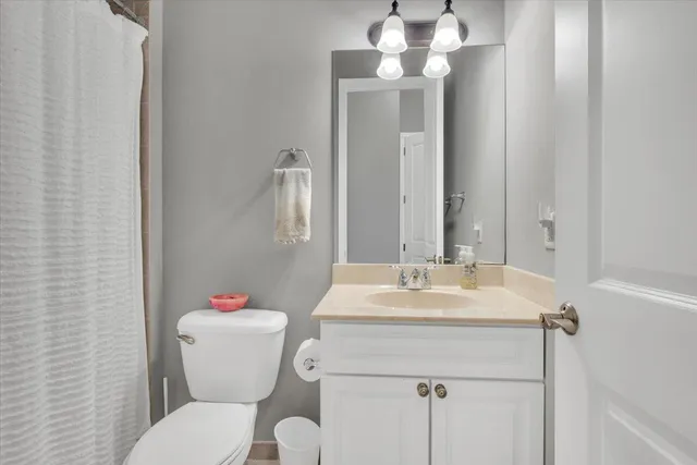 a bed room with a bed and a television