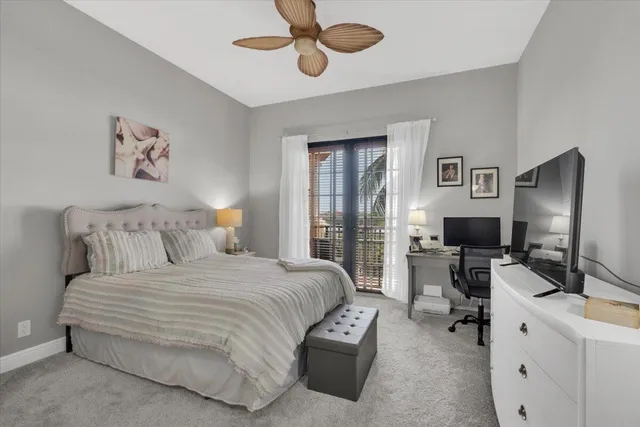 a living room with furniture and a gate