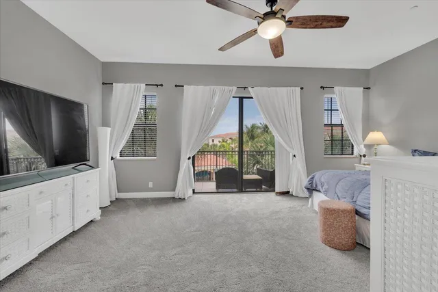 an aerial view of residential houses with outdoor space and street view