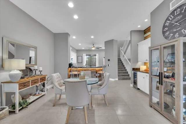 a kitchen with stainless steel appliances kitchen island granite countertop a sink and cabinets