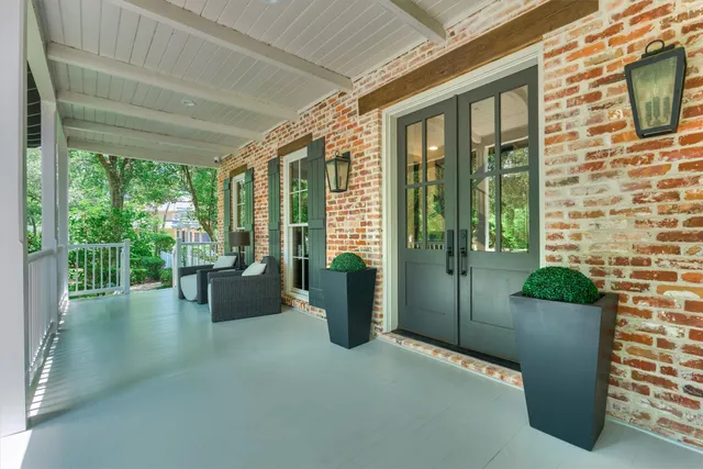 a view of a porch with furniture