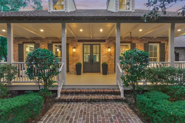 a front view of a house with a porch