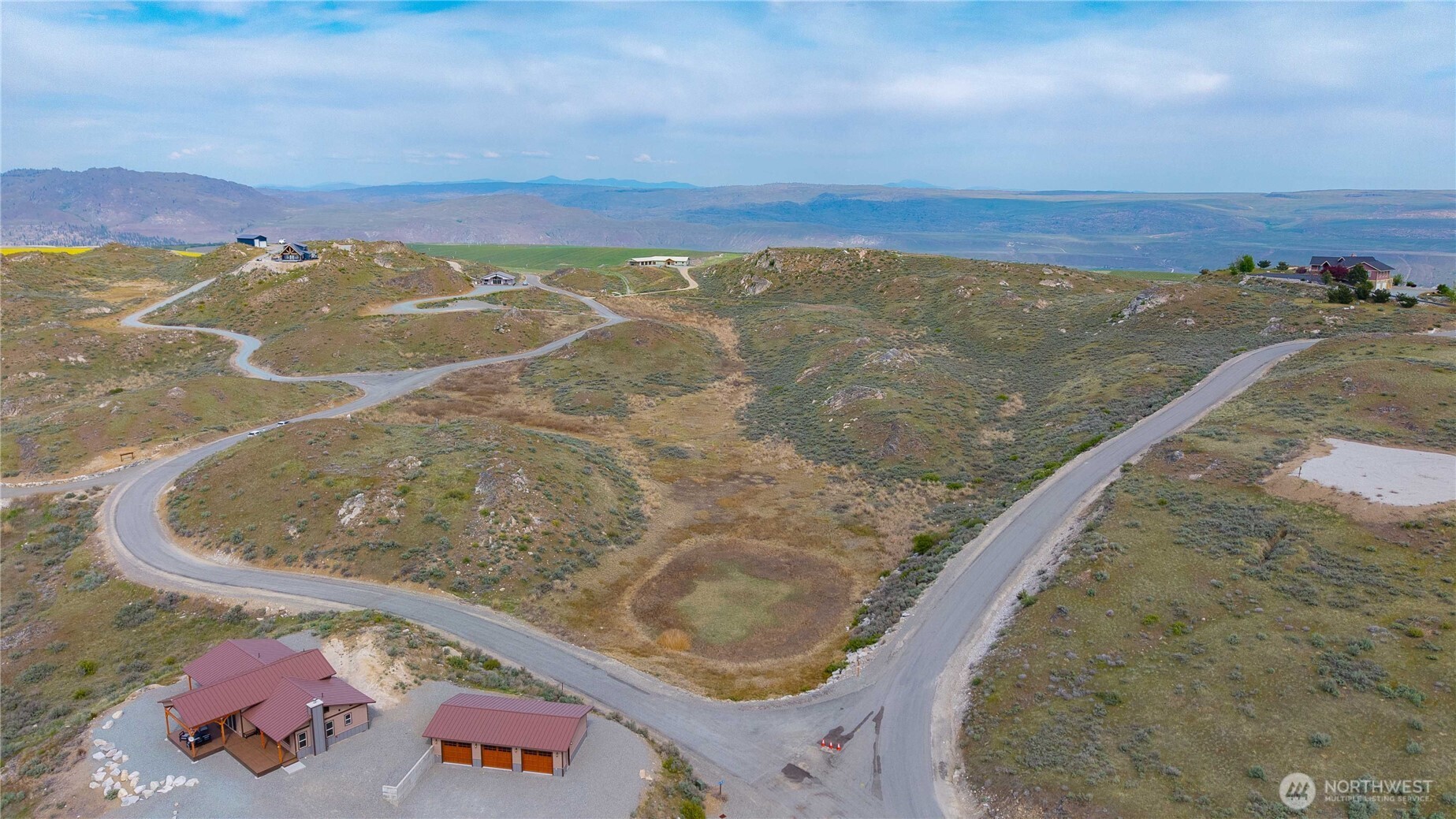 1-azteca Plata Road Brewster, WA 98812 - Photo 16 of 40 a view of a lake from a balcony