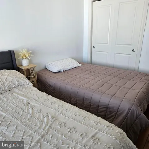 a bathroom with a sink vanity and toilet
