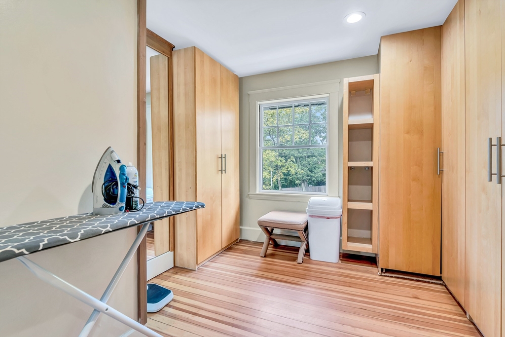 17 Atlantic Avenue, Unit MAIN HOUSE Cohasset, MA 02025 - Photo 19 of 22 a very nice looking room with a large window and wooden floor